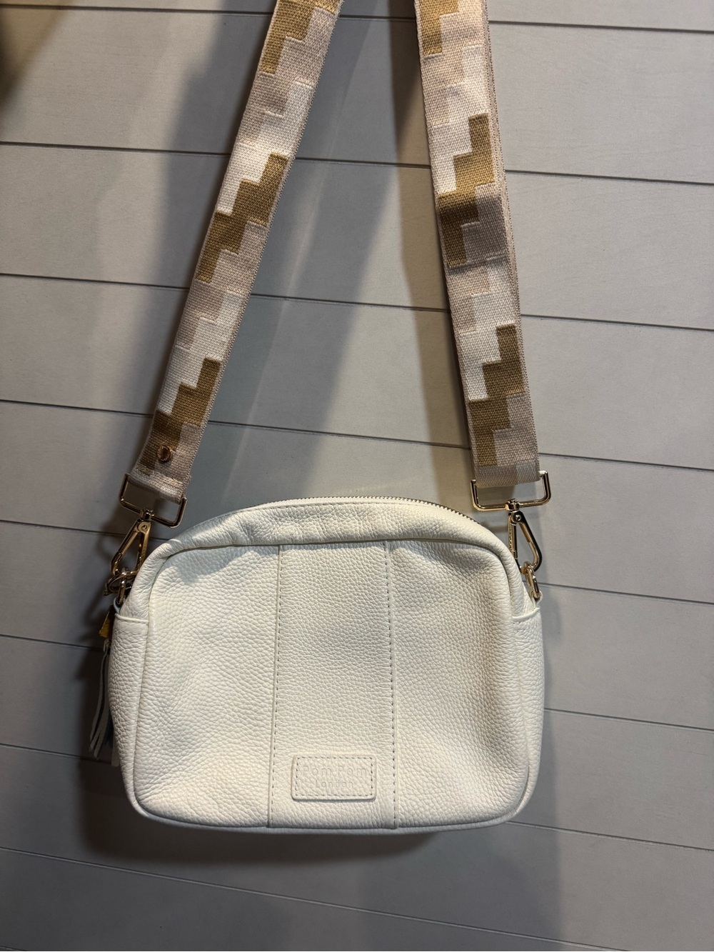 White Pebbled Crossbody Bag with Patterned Beige Strap